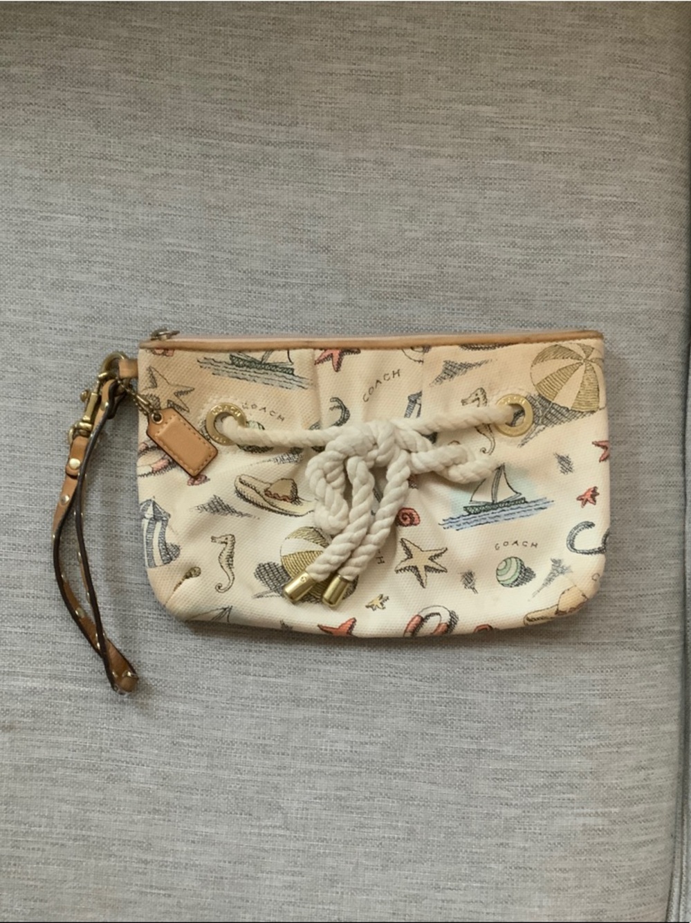 COACH Cream Nautical-Print Wristlet with Rope Detail